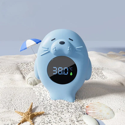 Bath thermometer for newborns, toddlers and young kids in blue sea otter style.
